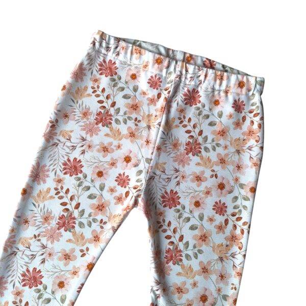 Flared legging pastel bloem perzik maat 98/104