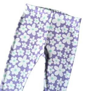 Flared legging lila bloemen maat 98/104